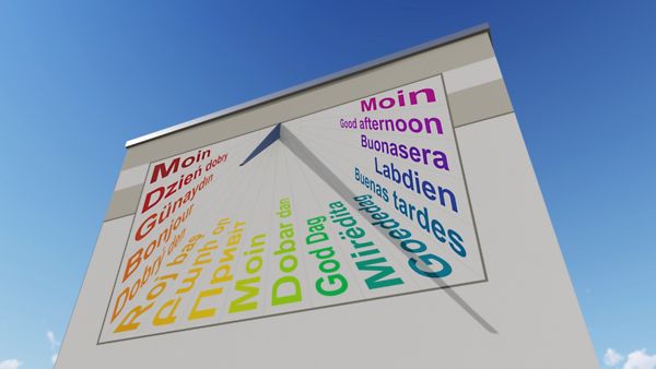 Bunte Sonnenuhr an der Fassade Grußformeln in verschiedenen Sprachen statt Ziffern